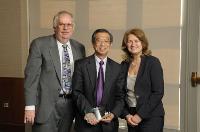 Photo taken at the presentation ceremony with Professor Mary Kalantzis, Dean of College of Education (left) and David Kietzmann (right), President-Elect of the Education Alumni Association.